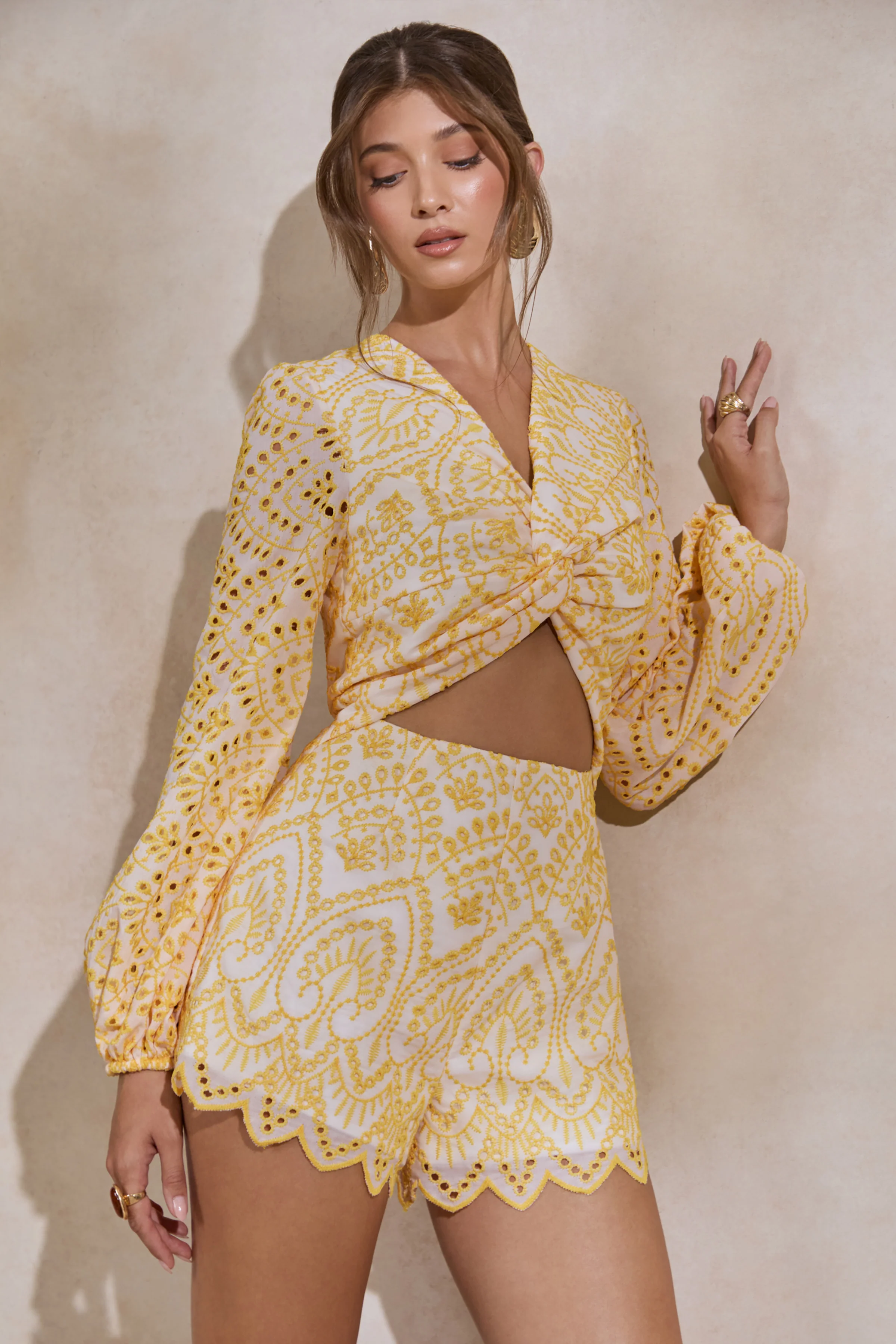 Ksenia | Lemon and White Broderie Plunge-Neck Romper With Twist Detail - Image 6